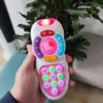 Montessori Baby Remote Control & Phone Toy, Soft Lights & Music for Early Sound & Visual Development, Newborn Birthday Gift